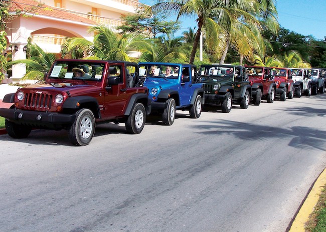 The Jeeps waiting for tourists to start the tour in Cozumel.