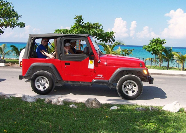 Peter and family very excited to see Cozumel while riding a Jeep.